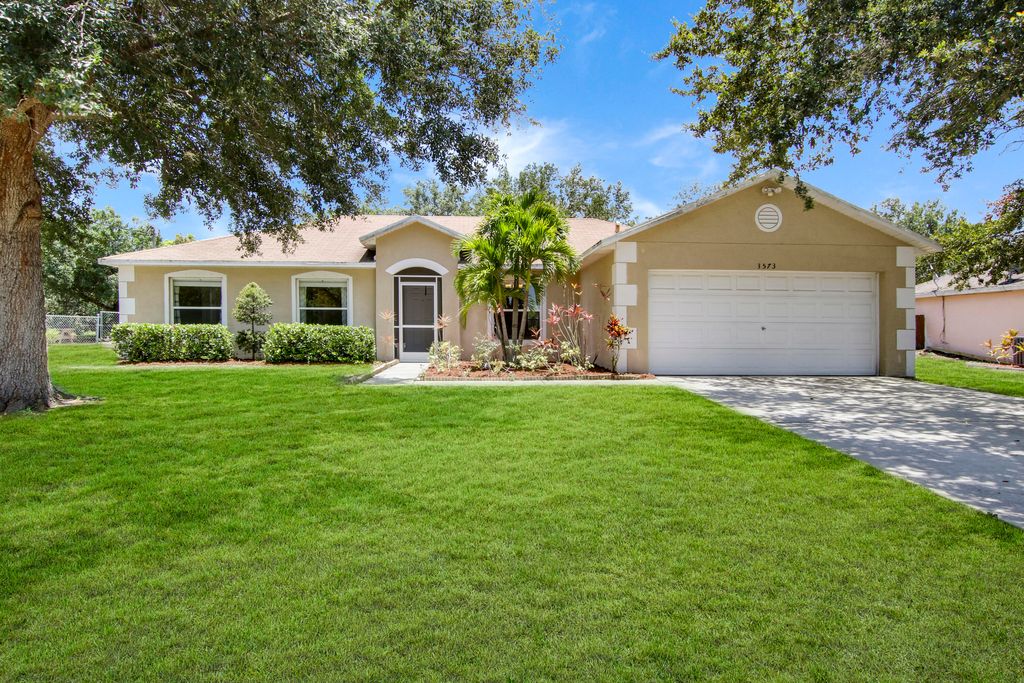 Photo of 3573 SW Kromrey Street St, Port St Lucie, FL 34953 (MLS # R10813490)