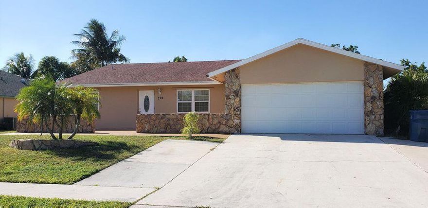 This property has a partial garage where the washer & dryer is located, the garage door is operable and the remaining garage space is 11X20. Landlord provides pool & lawn maintenance. Tenant pays water. 1st month, last month & security deposit required. Spacious Royal Palm Beach pool home on a canal in sought after La Mancha area, located on a quiet street... features an open floor plan and ceramic tile floors. Kitchen opens to dining & living area and features a large dining/snack bar. Extra large master suite features tub & shower. Conveniently located close to great restaurants & shopping, downtown WPB, the Turnpike & I-95, Palm Beach International Airport, Fairgrounds and good schools.