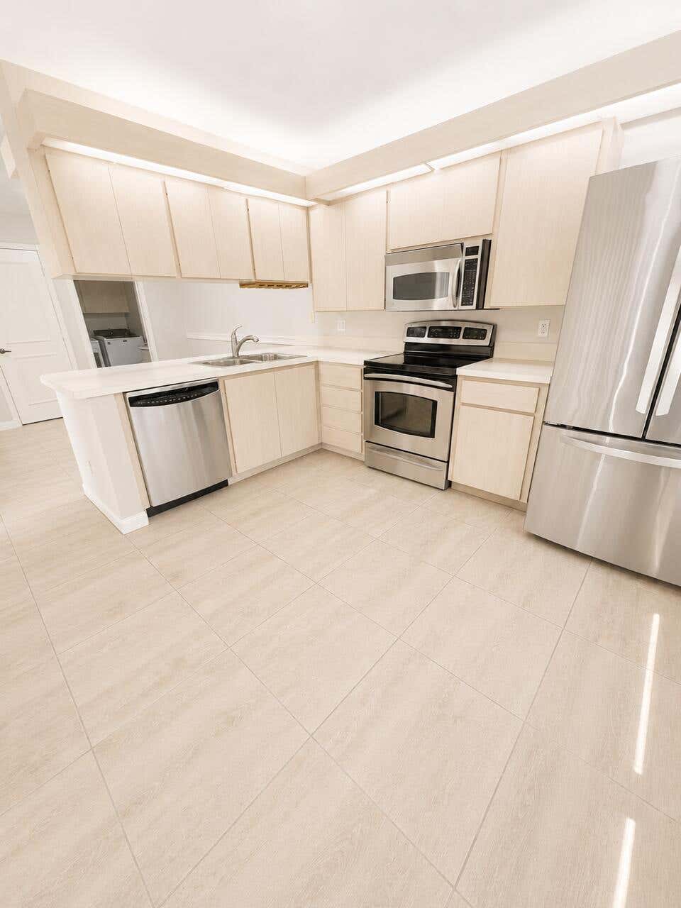 Photo of 3115 Kingston Court, West Palm Beach, FL 33409 (MLS # B26037493)