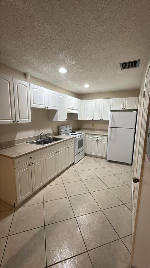 Photo of 2004 S 10th St #A, Fort Pierce, FL 34950 (MLS # F10538369)