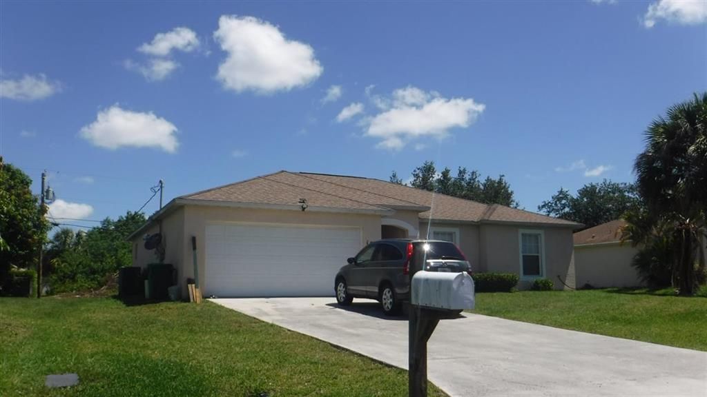 Photo of 1077 SW Jennifer Terrace, Port Saint Lucie, FL 34953 (MLS # R10683402)