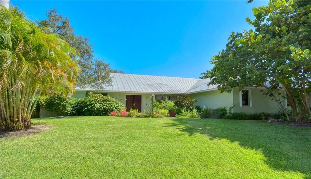 Photo of 2883 NE Rosetree Dr, Jensen Beach, FL 34957 (MLS # F10299290)