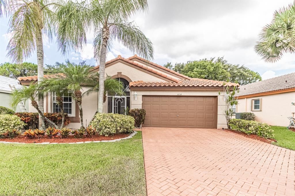 Photo of 5658 Swaying Palm Lane Ln, Boynton Beach, FL 33437 (MLS # R10810202)