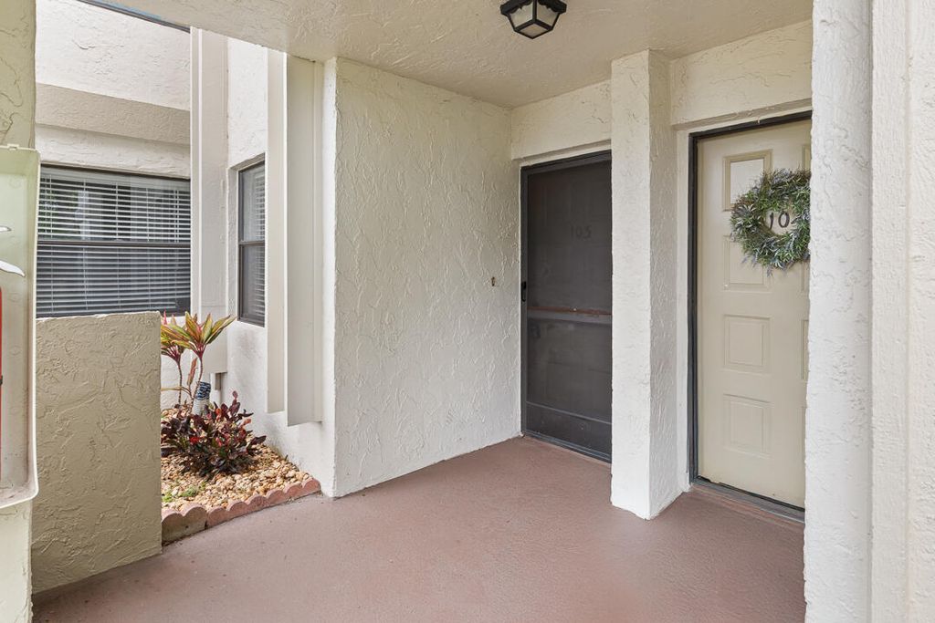 Photo of 12962 Briarlake Drive #103, Palm Beach Gardens, FL 33418 (MLS # B26010207)