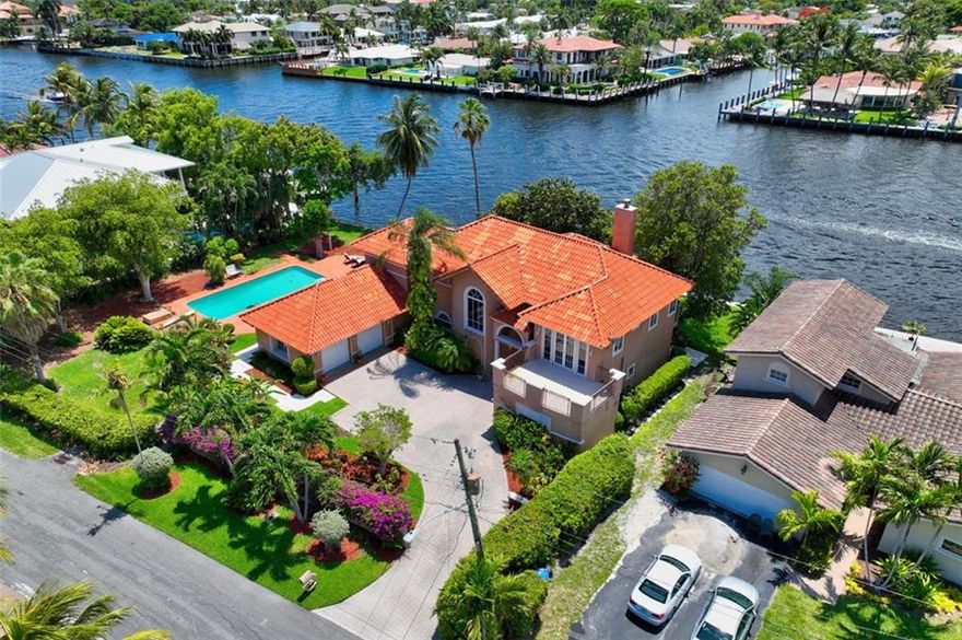 Direct Intracoastal double lot with 154 ft of exciting waterfront, enjoy the exciting boat parade every day. This gated 18,000 Sqft property features a 5000 square ft home with 4 large bedrooms, 3 full baths and 2 half baths. Floor to Ceiling windows and spectacular waterfront views from every room. This Executive Estate is in the exclusive neighborhood of Hillsboro Shores. Unique access to Private Beach with gated entry, silky sand and spectacular views of the Hillsboro Lighthouse! The positioning of this home on the double lot may allow the rare opportunity to build a spectacular guest house or subdivide and build a second home.