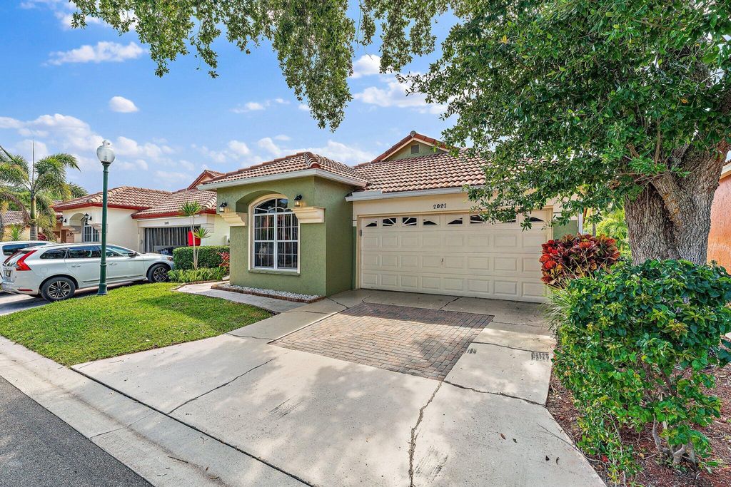 Photo of 2091 Bonisle Circle, Riviera Beach, FL 33418 (MLS # R10795589)