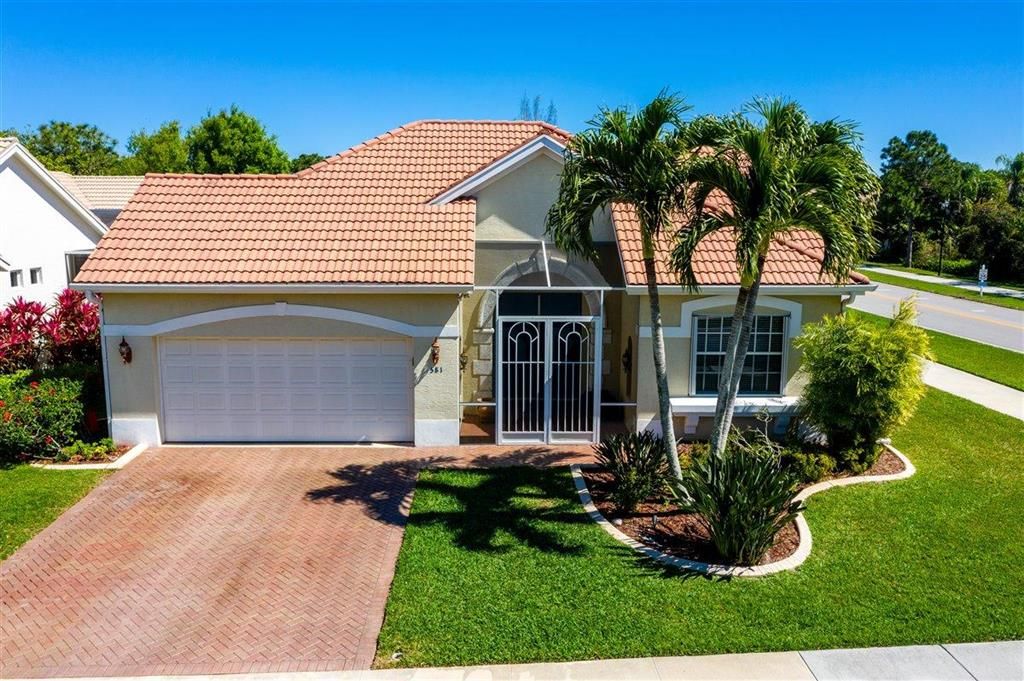 Photo of 581 SW Saint Johns Bay, Port Saint Lucie, FL 34986 (MLS # R10695412)