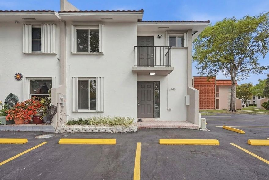 Welcome to 76 Terrace Townhomes LLC, a boutique 15-unit townhome community ideally located in the Hollywood/Davie area. This beautifully designed 2 bedroom, 2 bathroom townhome offers over 1,000 sq. ft. of living space with a functional layout and modern finishes throughout. The first floor features an open-concept living and dining area, a full kitchen, and a convenient guest bathroom, all leading out to a private backyard—perfect for relaxing or entertaining. Upstairs, you'll find two spacious bedrooms along with a full bathroom in the hallway. The home is finished with beautiful hardwood flooring throughout, complemented by modern lighting and updated bathrooms. Enjoy multiple outdoor spaces, including private balconies and a backyard,