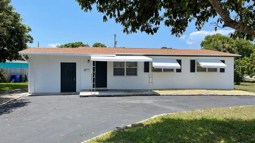 Photo of 805 Date Palm Drive Dr, Lake Park, FL 33403 (MLS # R10810612)