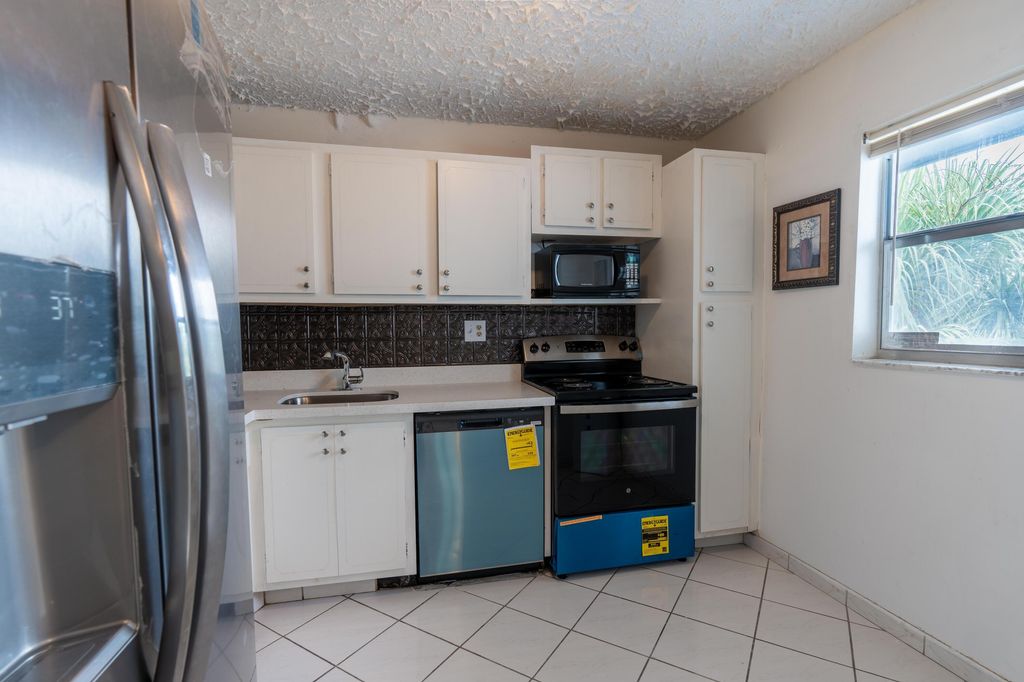 Photo of 8360 Sands Point Boulevard #G306, Tamarac, FL 33321 (MLS # B26017751)