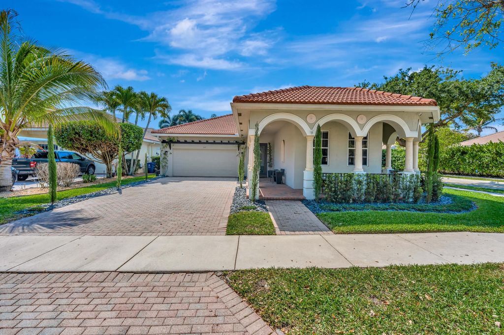 Photo of 207 Via Rosina, Jupiter, FL 33458 (MLS # B26007898)