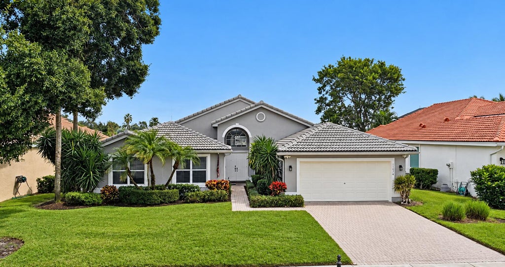 Photo of 11674 Caracas Boulevard, Boynton Beach, FL 33437 (MLS # B26091836)