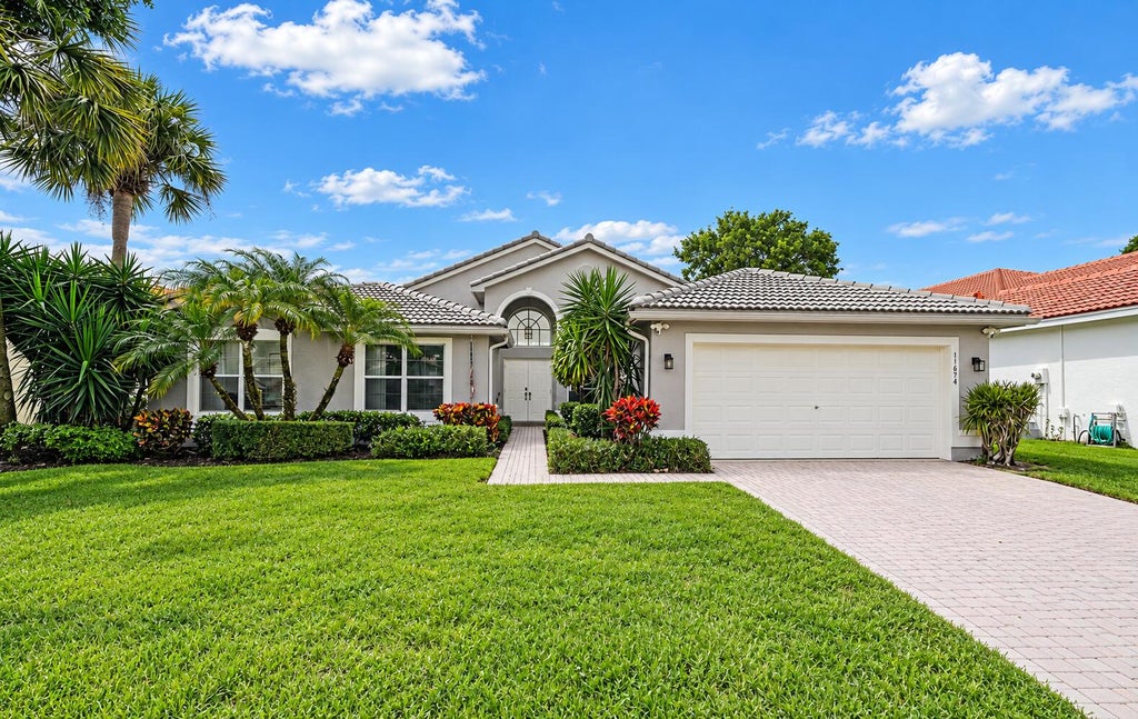 Photo of 11674 Caracas Boulevard, Boynton Beach, FL 33437 (MLS # B26091836)