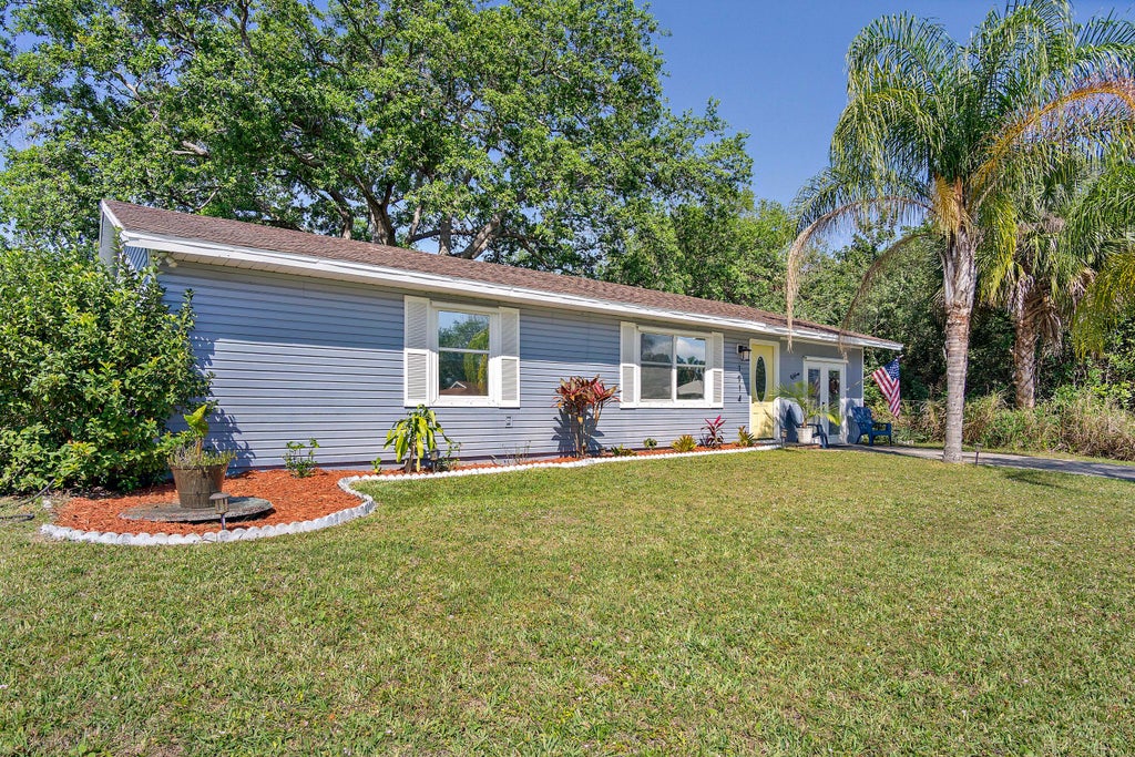 Photo of 1914 SW Beauregard Street, Port Saint Lucie, FL 34953 (MLS # R10967962)