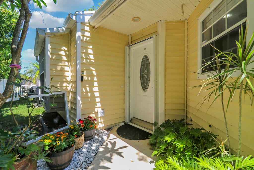 Photo of 1437 Dandelion Lane, West Palm Beach, FL 33415 (MLS # B26023694)