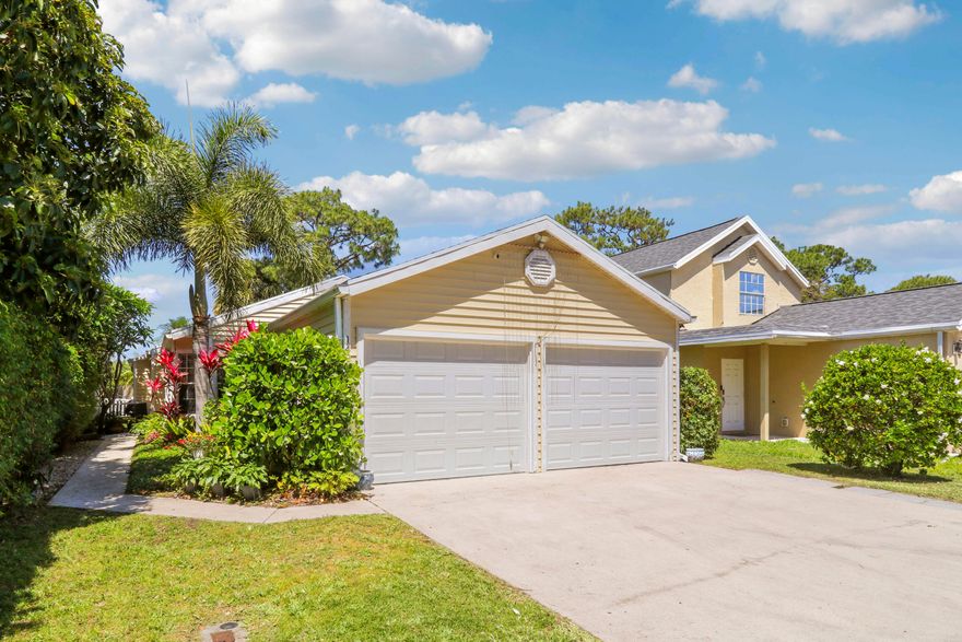 Welcome to this beautifully updated single-family home located in Victoria Woods, a gated community in West Palm Beach with an incredibly low HOA offering the perfect combination of value, comfort, and lifestyle.  This 2-bedroom, 2-bathroom home with a spacious 2-car garage is ideally positioned at the end of a quiet street, providing added privacy and minimal traffic. Inside, you'll find a light-filled layout with tile flooring throughout the main living areas and laminate wood flooring in the bedrooms  for a warm, cohesive feel.   The open kitchen and updated bathrooms give the home a modern touch, while French doors from both the living room and primary suite lead out to your private patio and yard perfect for relaxing or entertaining.  BRAND NEW ROOF installed in April 2026 offers peace of mind for years to come. Residents enjoy access to a wide range of community amenities including a pool, pavilion with BBQ grills, tennis courts, basketball, racquetball, a tot lot, baseball field, and sand volleyball all within a secure, gated setting.  If you're looking for a move-in ready home with updates, privacy, and low-maintenance living in West Palm Beach, this is one you don't want to miss.