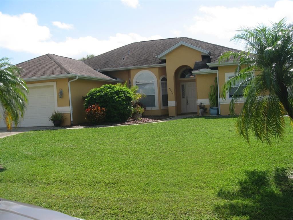 Photo of 6959 NW Hershy Circle, Port St Lucie, FL 34983 (MLS # R10890572)