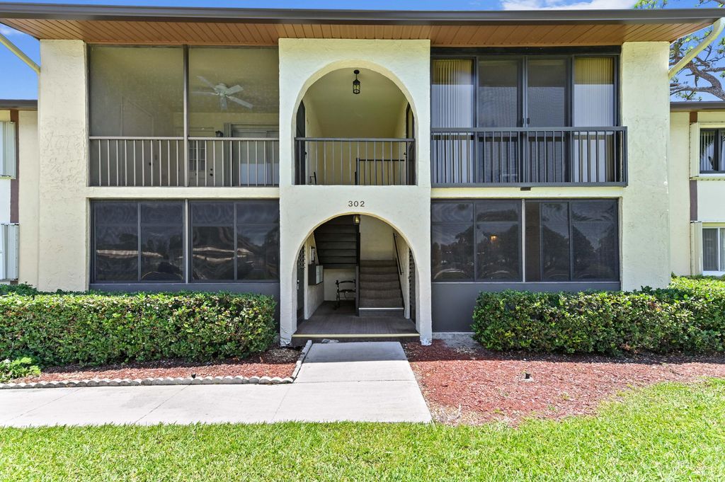 Photo of 302 Knotty Pine Circle #D-1, Greenacres, FL 33463 (MLS # R11089253)