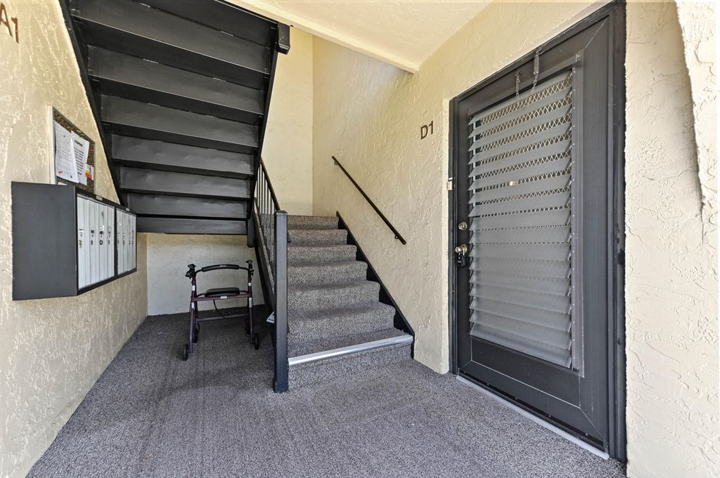 Photo of 302 Knotty Pine Circle #D-1, Greenacres, FL 33463 (MLS # R11089253)