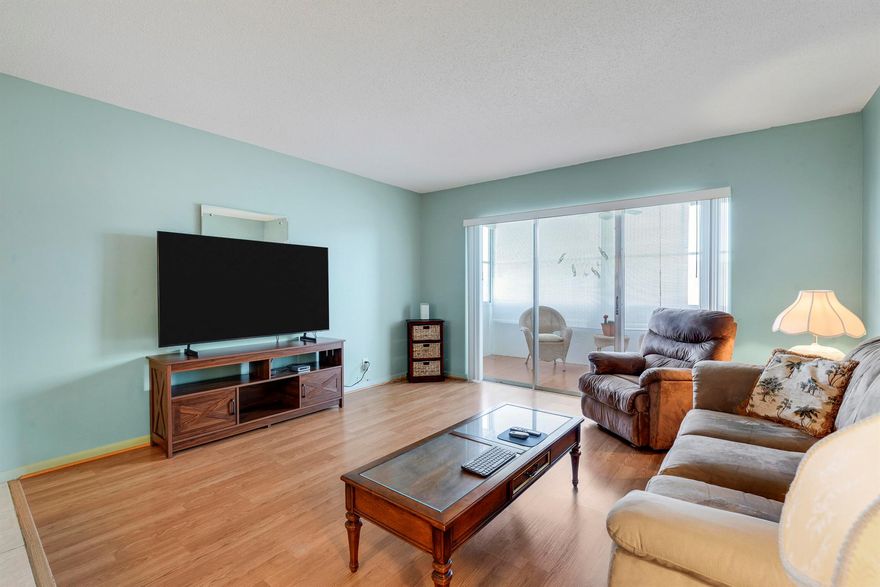 Turn-Key 1/1 Condo with Lake Views - Lakeside Village 55+ Fully furnished 3rd-floor unit with stunning lake views, close to elevator & stairs. Impeccably maintained with a newer HVAC--just move right in!Enjoy resort-style amenities: 2 heated pools, fitness center, billiards, mini-golf, theater, and a community park with walking track & outdoor exercise equipment.Prime location minutes from JFK Medical Center, PBI Airport, beaches, golf, shopping & Brightline/Tri-Rail. Leasing permitted after 2 years.