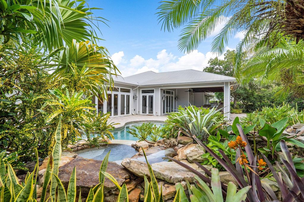 Photo of 5570 SW Coral Tree Lane, Palm City, FL 34990 (MLS # R10909415)