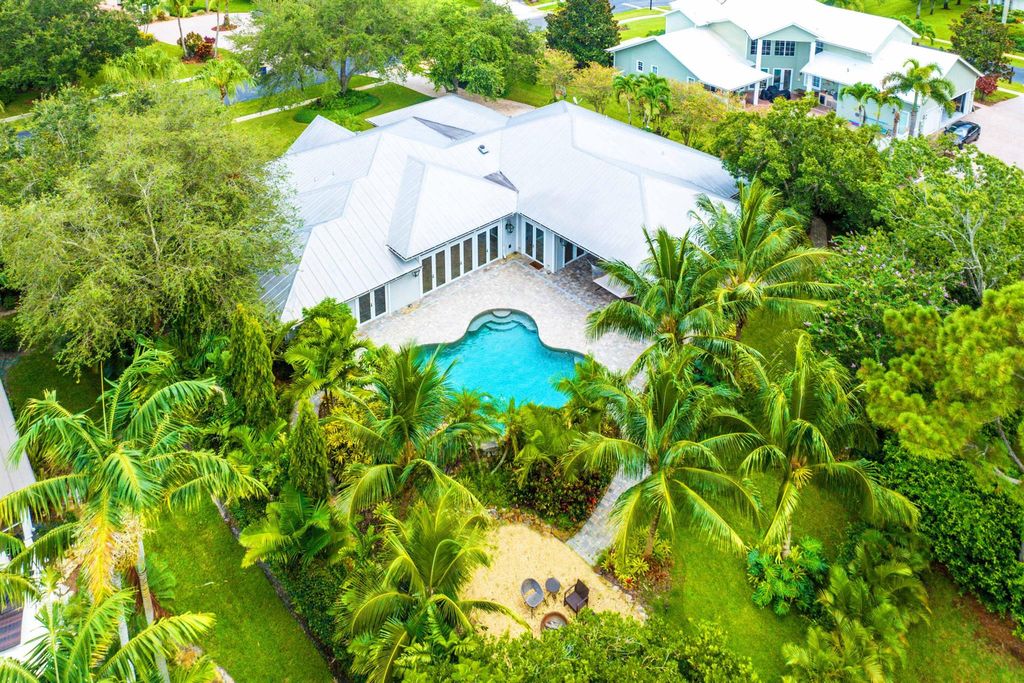 Photo of 5570 SW Coral Tree Lane, Palm City, FL 34990 (MLS # R10909415)