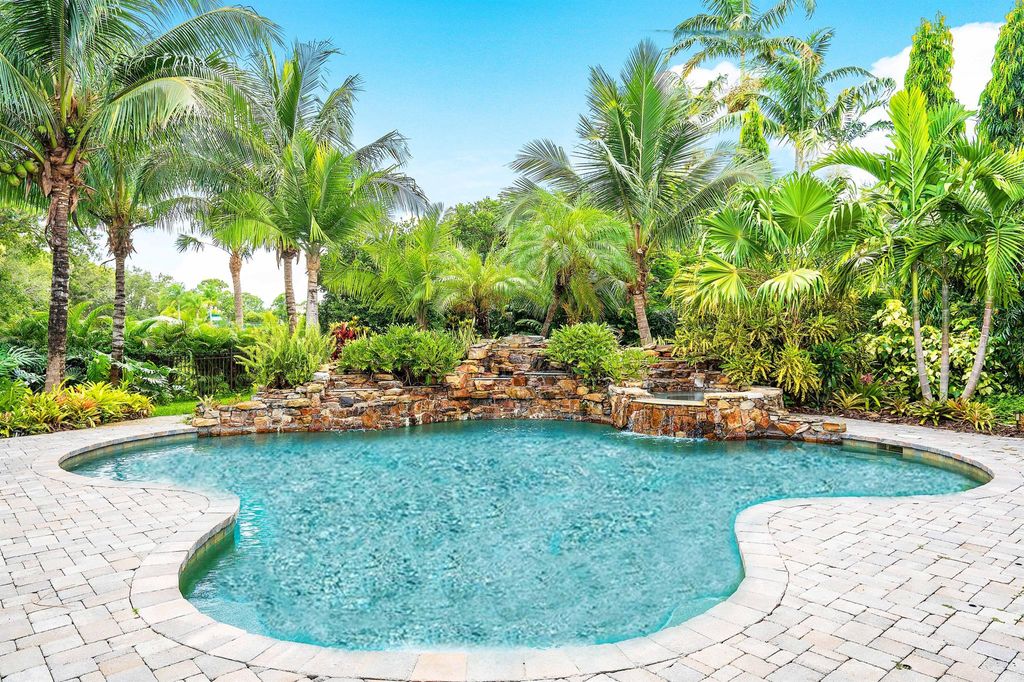 Photo of 5570 SW Coral Tree Lane, Palm City, FL 34990 (MLS # R10909415)