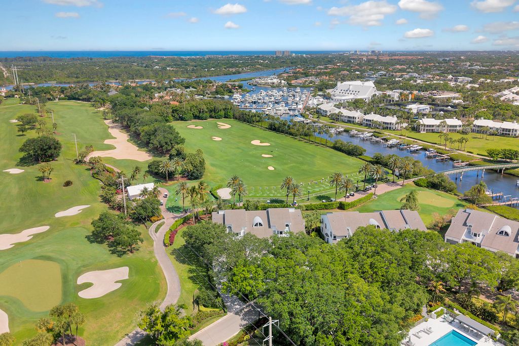 Photo of 310 Spyglass Way, Jupiter, FL 33477 (MLS # B26015613)