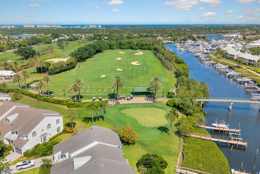 Photo of 310 Spyglass Way, Jupiter, FL 33477 (MLS # B26015613)