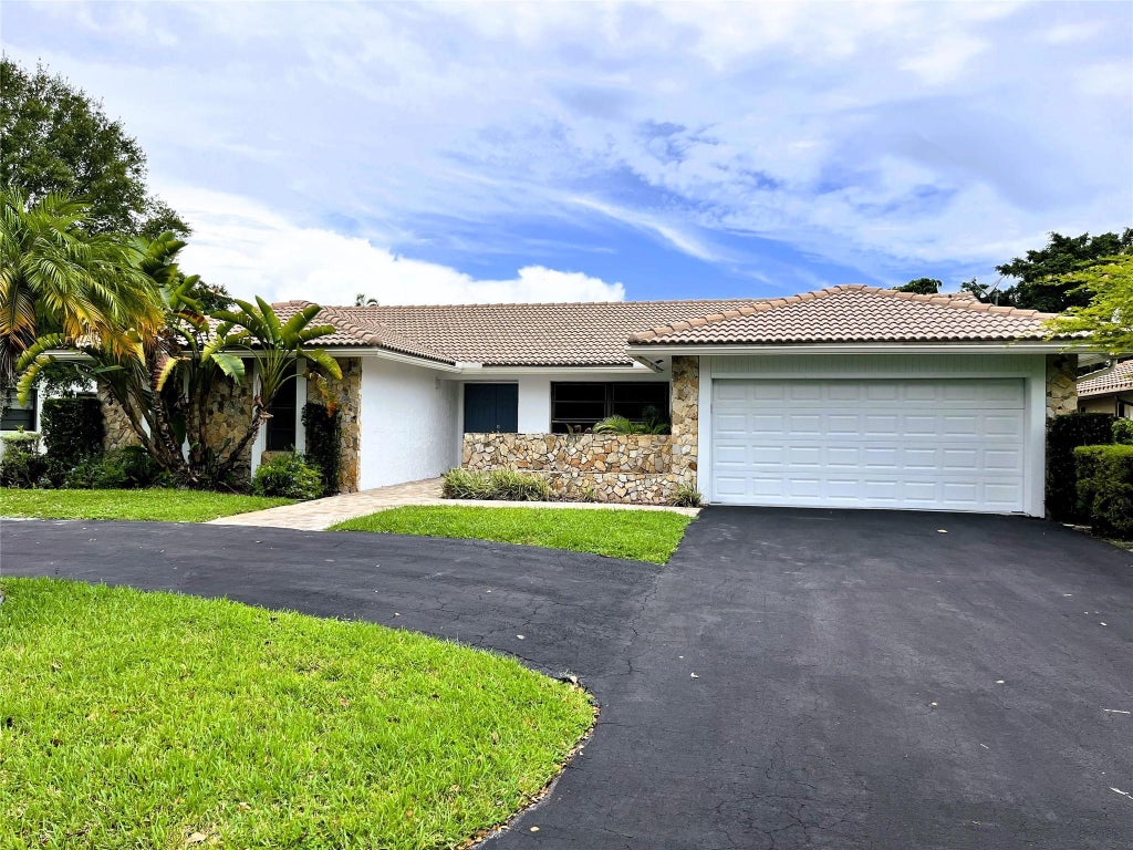 Photo of 11375 NW 19TH Drive, Coral Springs, FL 33071 (MLS # B26076931)