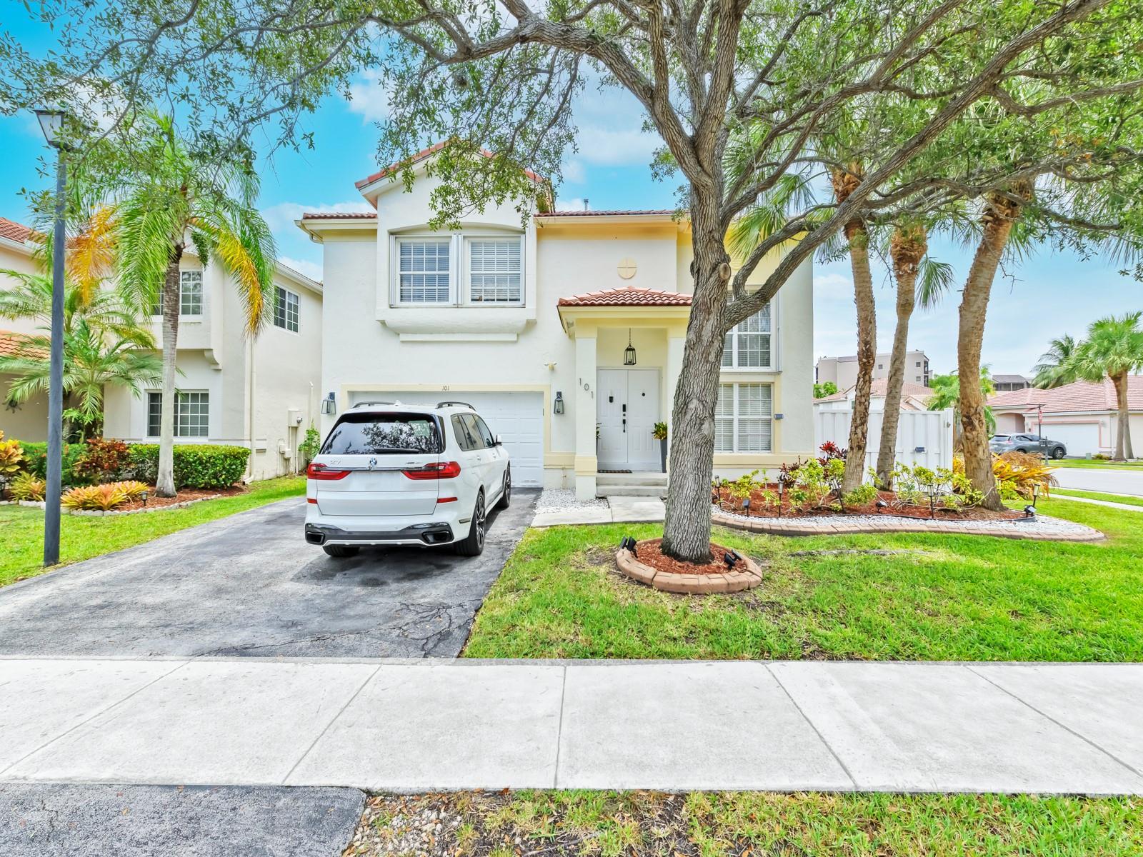 Stunning 5-bedroom, 4-bathroom two-story single-family home in Weston! This spacious residence features a convenient first-floor bedroom and full bath, ideal for guests or in-laws. Soaring high ceilings enhance the open layout, while a sleek glass and stainless steel stair railing adds a modern touch.
Enjoy energy savings with SOLAR PANELS and a fenced backyard complete with a lovely patio—perfect for outdoor entertaining. Tenants will enjoy access to the BONAVENTURE TOWN CENTER CLUB, offering outstanding amenities including a community pool, fitness center, tennis courts, indoor pickleball, basketball, bowling, and more! Located in a community served by top-rated schools. Lawn maintenance, basic internet & cable included in rent. Can be rented UNFURNISHED OR FURNISHED.