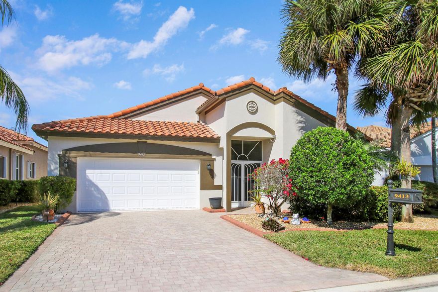 NEW ROOF Installed August, 2025! Welcome to Beautiful Bellaggio! This is a Spacious, 3 Bedroom, 2 bath, Magnificent Home, with a breathtaking Water-view and a Screened-in Private Pool, Spa, Shower and Awning. As you enter though the Impact Glass Double Doors, you cannot help but notice the large Open Floor plan. The Refaced Kitchen, with Custom Cabinets Granite Countertops and Backsplash, also has a cozy Breakfast Nook overlooking the Pool & Lake. Also featured is a Walk-in Pantry. The Master Bedroom Suite has 2 Walk-in Custom Closets and a Master Bathroom with a Separate Shower & Roman Tub with Dual His & Hers Vanities. The Guest Bathroom has been updated.