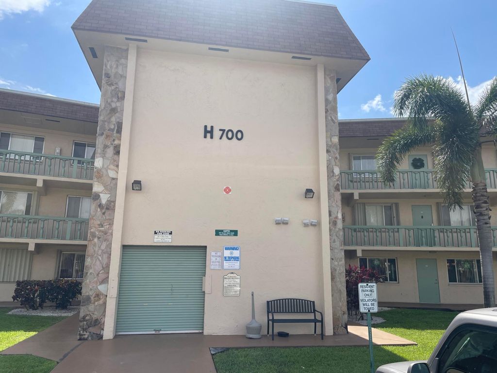 Photo of 700 Village Green Court #101, Palm Springs, FL 33461 (MLS # B26031117)
