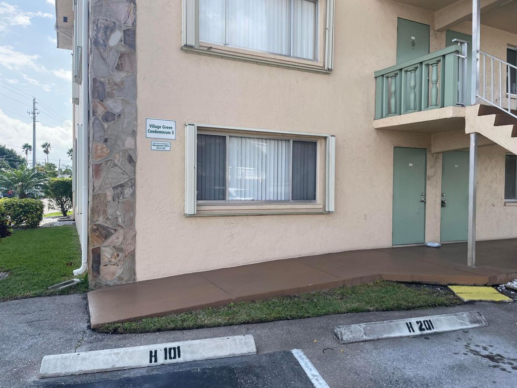 Photo of 700 Village Green Court #101, Palm Springs, FL 33461 (MLS # B26031117)