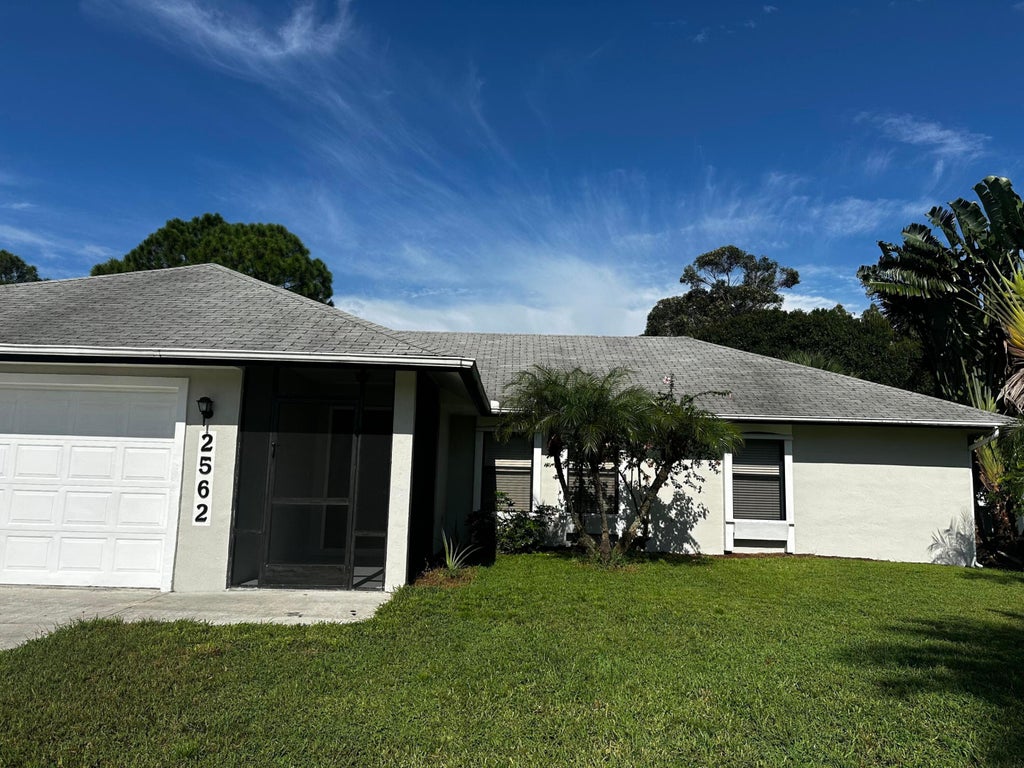 Photo of 2562 SW Kenilworth Street, Port Saint Lucie, FL 34953 (MLS # R11022716)