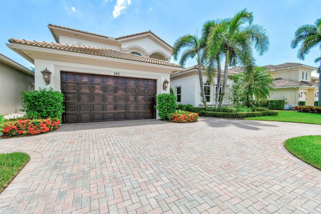 Photo of 340 Charroux Drive, Palm Beach Gardens, FL 33410 (MLS # R10916117)
