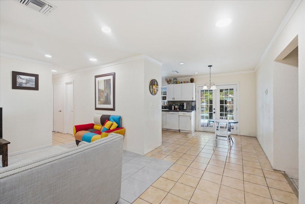 Photo of 325 NW Dearman Street, Port Saint Lucie, FL 34983 (MLS # B26035413)
