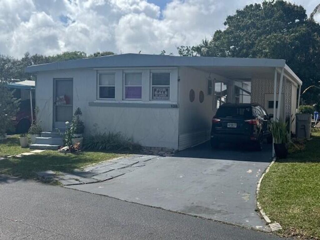 Photo of 128 Havenwood, Pompano Beach, FL 33064 (MLS # B26001089)