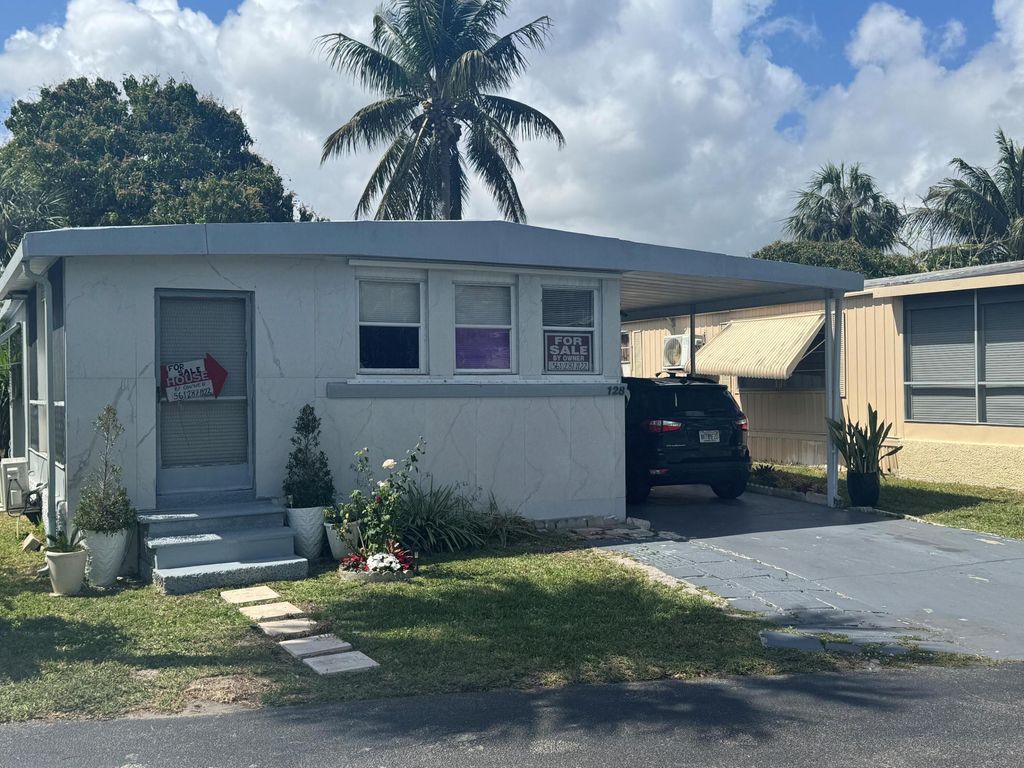 Photo of 128 Havenwood, Pompano Beach, FL 33064 (MLS # B26001089)