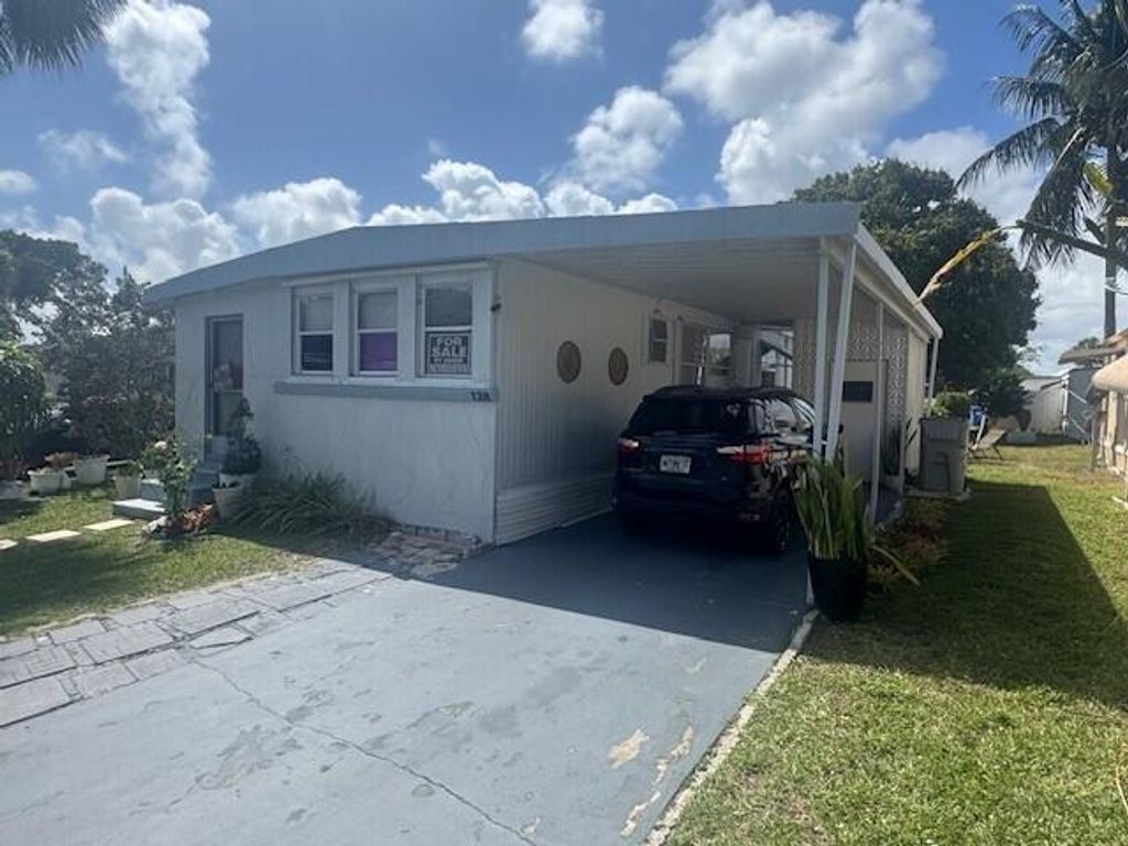 Photo of 128 Havenwood, Pompano Beach, FL 33064 (MLS # B26001089)