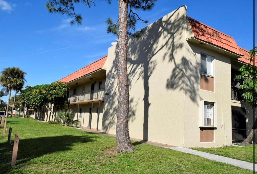 Photo of 6060 Forest Hill Boulevard #106, West Palm Beach, FL 33415 (MLS # B26073790)
