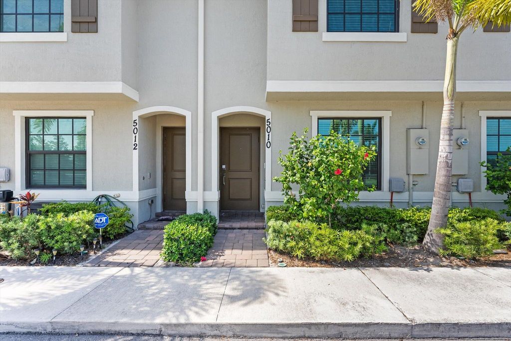 Photo of 5010 Genove Place, Riviera Beach, FL 33410 (MLS # R10994662)