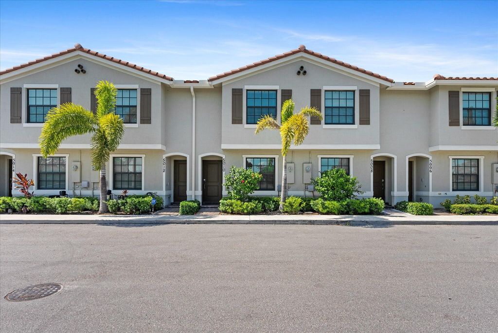 Photo of 5010 Genove Place, Riviera Beach, FL 33410 (MLS # R10994662)