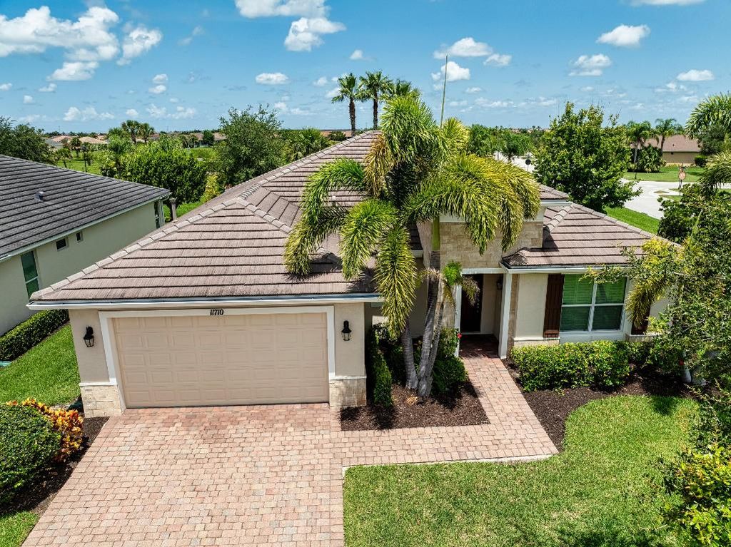 Photo of 11710 SW Apple Blossom Trail, Port Saint Lucie, FL 34987 (MLS # R11097745)