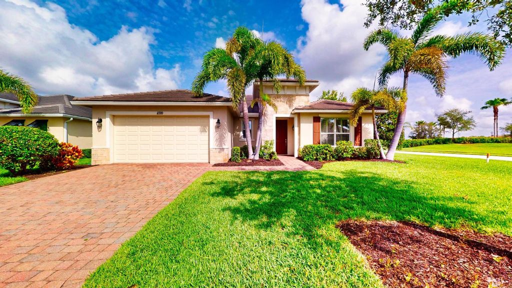 Photo of 11710 SW Apple Blossom Trail, Port Saint Lucie, FL 34987 (MLS # R11097745)