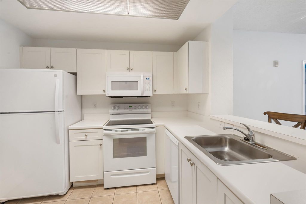 Photo of 2808 Amalei Drive #106, Palm Beach Gardens, FL 33410 (MLS # R10955682)