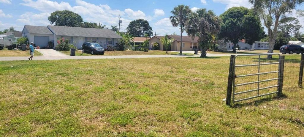 Photo of 9000 Melody Drive, Lake Worth, FL 33467 (MLS # R10991125)