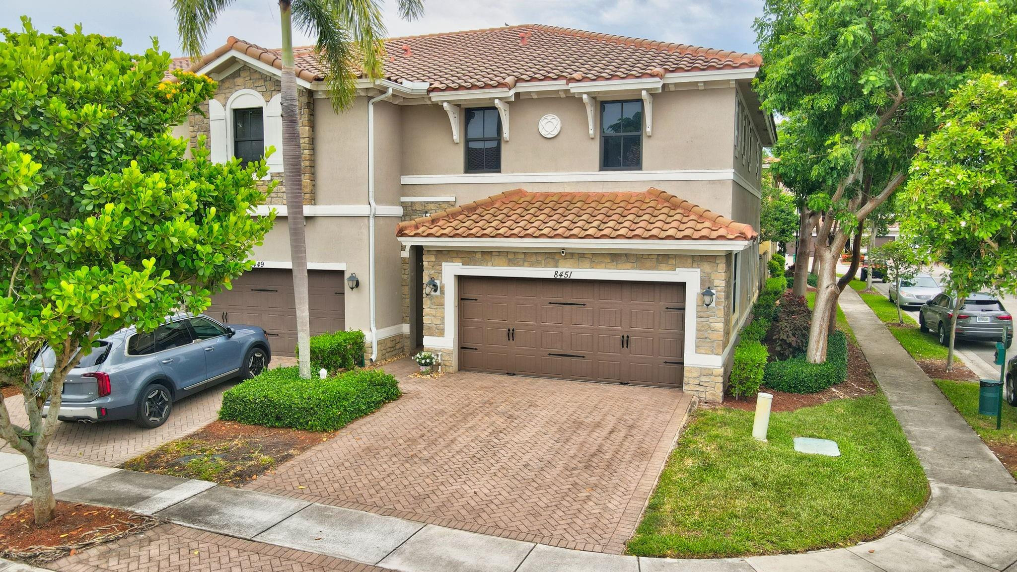 LOWEST PRICED END UNIT! Do not miss this beautiful 3BR/2.5BA with Generator & water filtration system. Enjoy impact windows & doors, sleek tiles on the 1st floor & wood look floors on staircase & 2nd level (no carpet!). Thoughtful upgrades include spa inspired master ensuite with luxurious stand-alone tub & walk-in shower, fully renovated guest bath, contemporary smooth-finish flat walls & ceilings, custom closets in all bedrooms, new Refrigerator, Dishwasher, Washer & Dryer & privacy/temperature-control window tinting on the first floor. The garage has tons of storage, bolted-in safes & Tesla EV charger. Step outside into your private, fully fenced backyard perfect for relaxing. Enjoy resort-style amenities at Mira Lago & Cascata - pools, fitness centers, tennis, 24-hr Guard Gate & more!