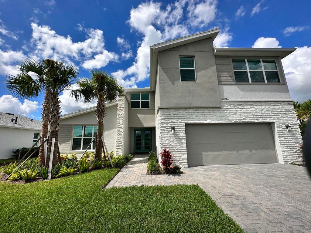 Photo of 10710 SW Hensley Street, Port Saint Lucie, FL 34987 (MLS # R11166895)