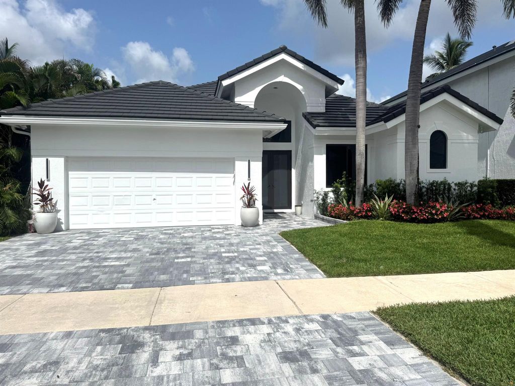 Photo of 4123 NW 53rd Street, Boca Raton, FL 33496 (MLS # R11097900)
